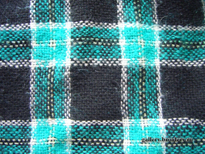 Ткань в клеточку. Состав: шерсть,мохер,люрекс.