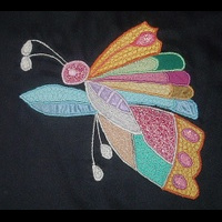 Бабочка на юбке для девочки