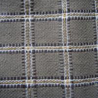 Ткань в клеточку с кожей