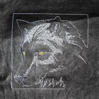Дизайн волка. Машинная вышивка по коже