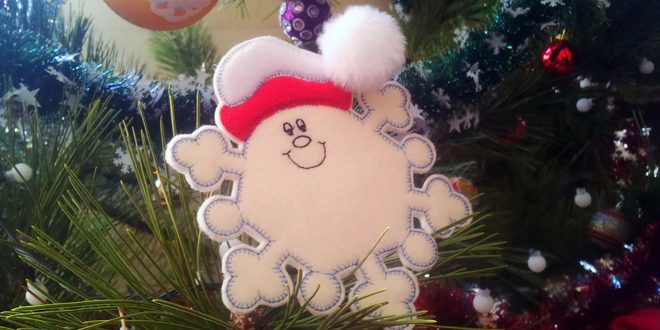 Машинная вышивка: Снежинки из фетра